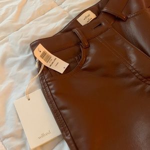 Aritzia vegan leather pants. New with tags! Size 00, long, color cognac